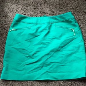 Green mini skirt